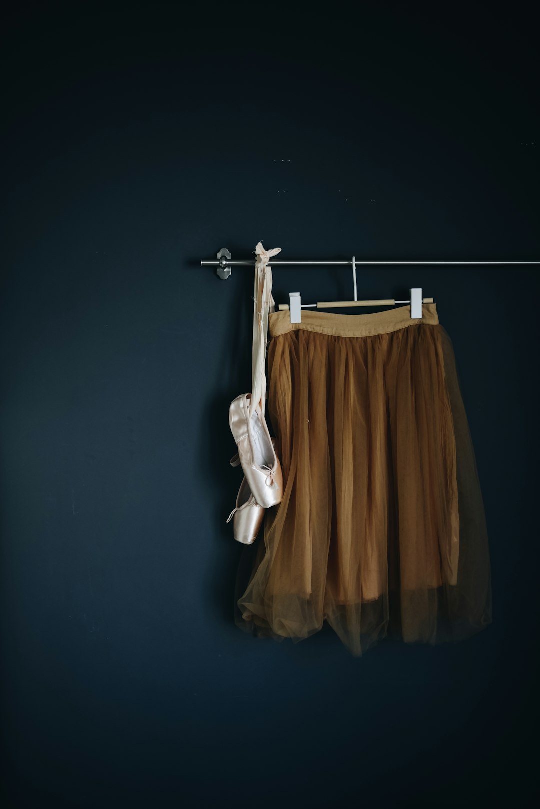 brown-skirt-hanged-on-wall-1pkjypsh8sw